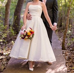 A line tea length satin strapless wedding dress